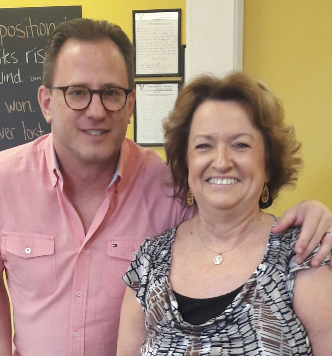 A happy client celebrating a pain-free life