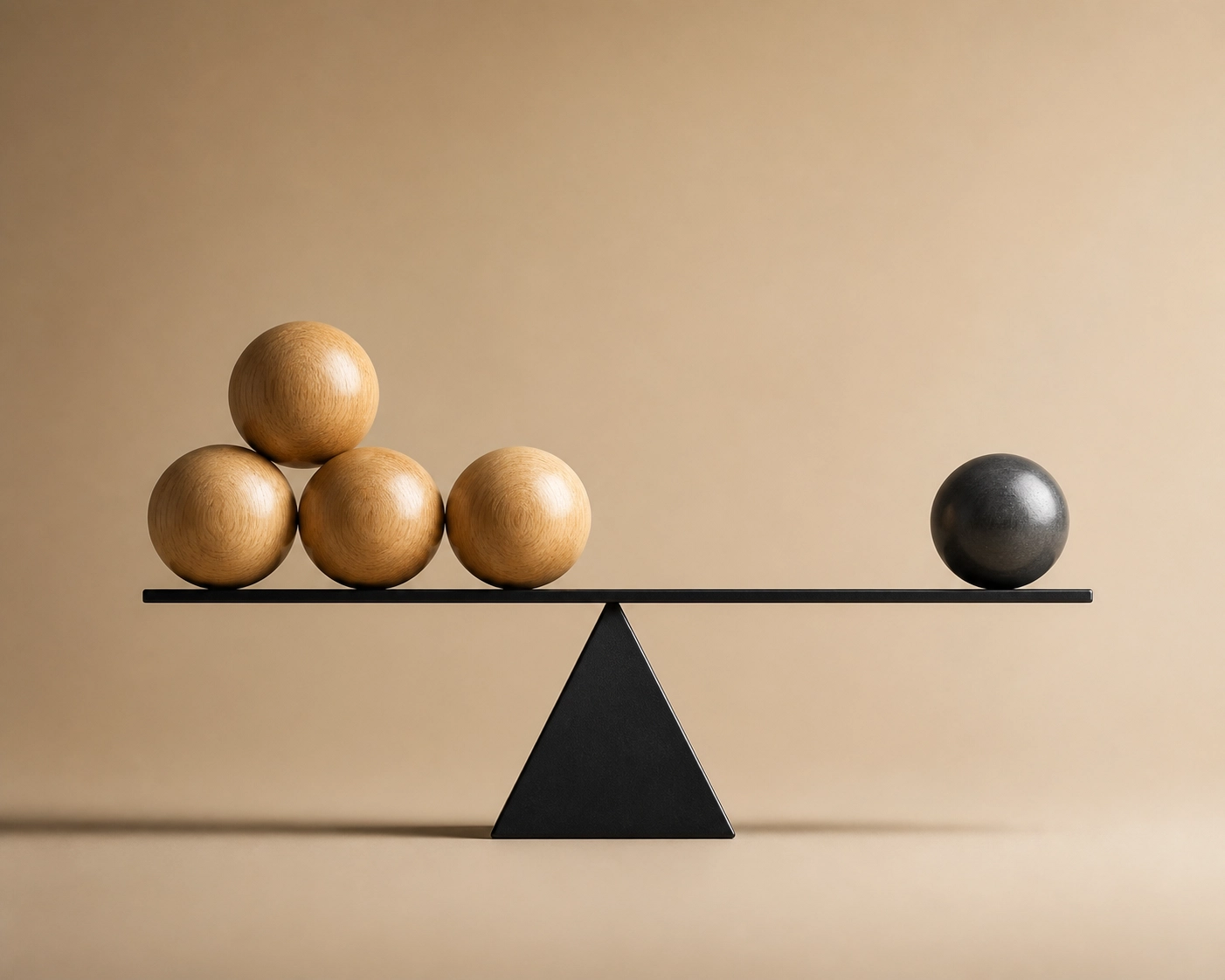 Wooden spheres balancing on a beam illustrating the body balancing method for sciatica pain relief.